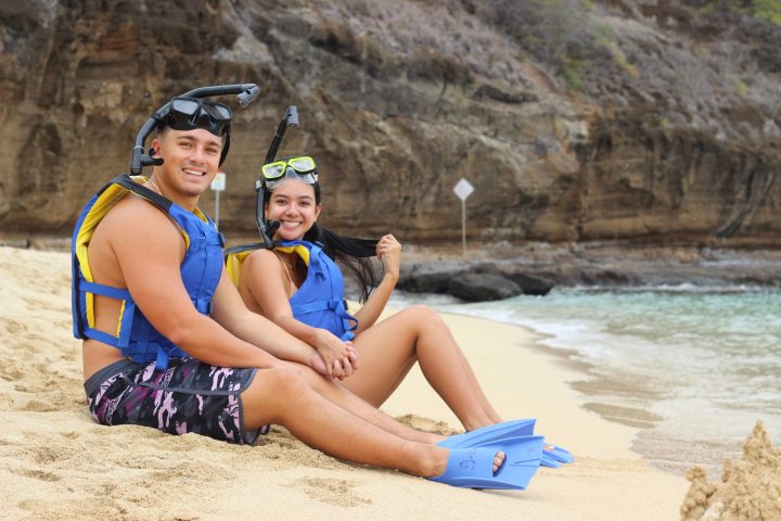 a person sitting at a beach